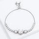 Adjustable Rhodium Plated Graduated Clear CZ Bolo Style Tennis Bracelet